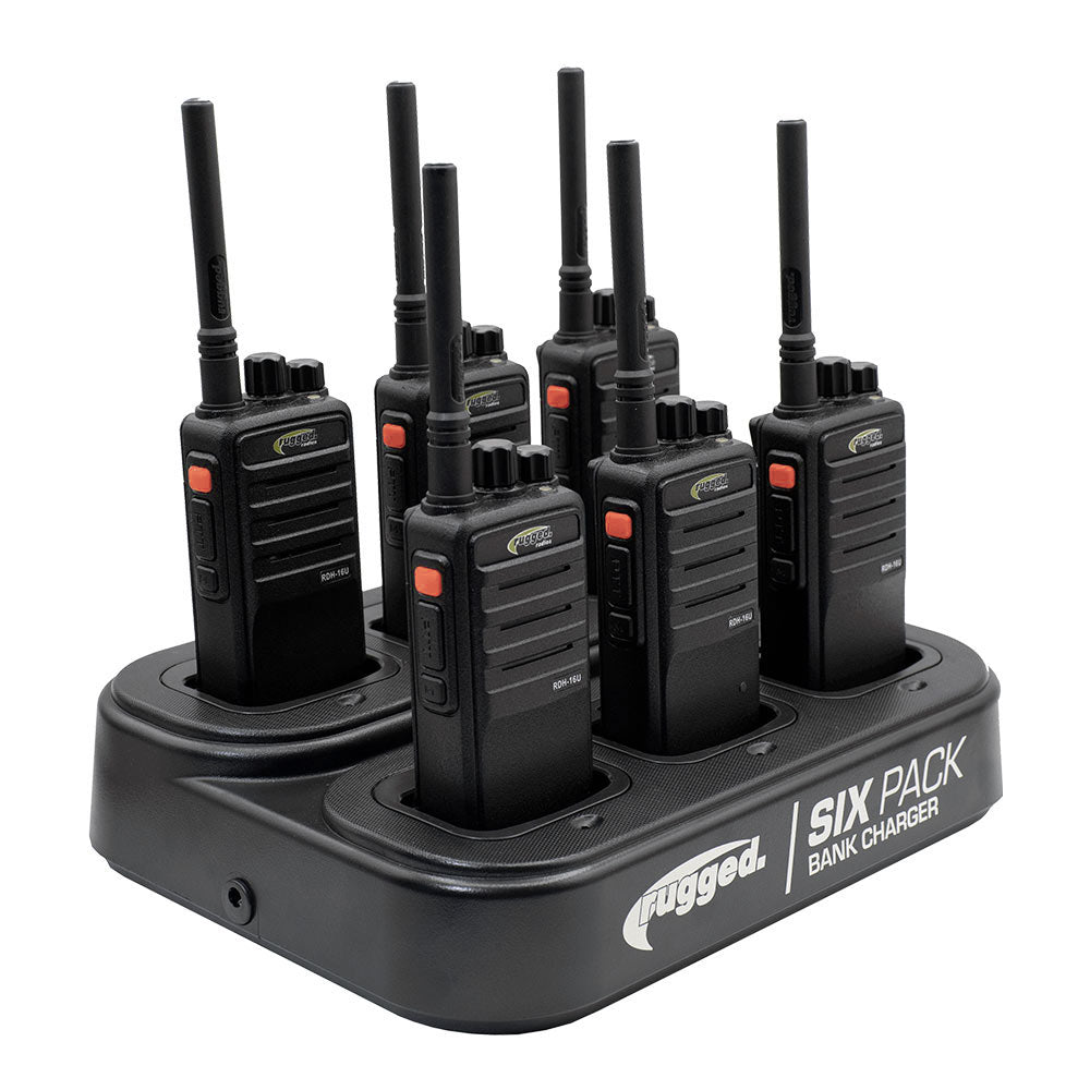 6 HANDHELD UHF RADIOS AND 1 BANK CHARGER